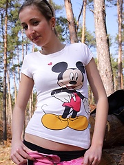 Very sexy teenager undressing naked in the woods