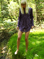 Danielka posing in a forest