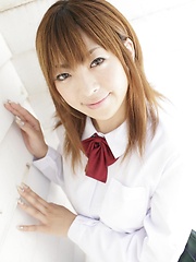 Shy japanese girl  Yu Mizuki posing in school uniform
