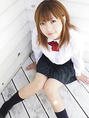 Shy japanese girl  Yu Mizuki posing in school uniform