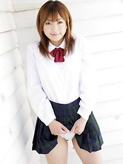 Shy japanese girl  Yu Mizuki posing in school uniform