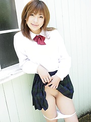 Shy japanese girl  Yu Mizuki posing in school uniform