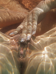 Kaylee and Silvie get hot and wet in the pool