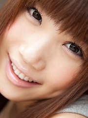 Honami Uehara posing her natural big tits in several outfits