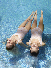 Hot girls playing in the pool