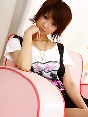 Perky Miriya Hazuki in green satin toyed with a vibrator