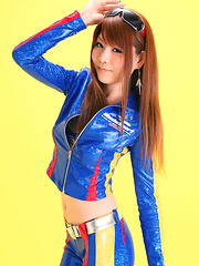 Minami Haduki Asian plays withlatex suit showing some curves