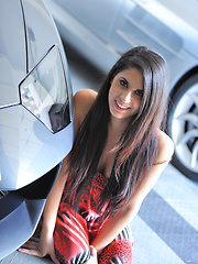 Lilly flashing by a car