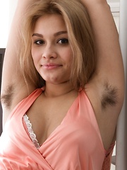Baby Lizza poses naked by mirror and strips naked