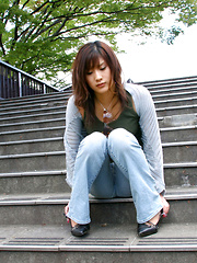 Sara Tsukigami Asian undresses and sits in naughty positions